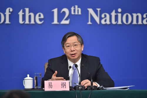 这是易纲在回答记者提问。 这是易纲在回答记者提问。